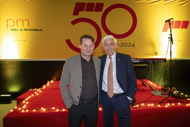 Poul Michelsen et al. posing for a picture