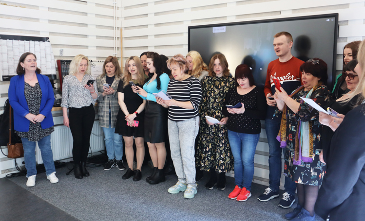 a group of people posing for a photo