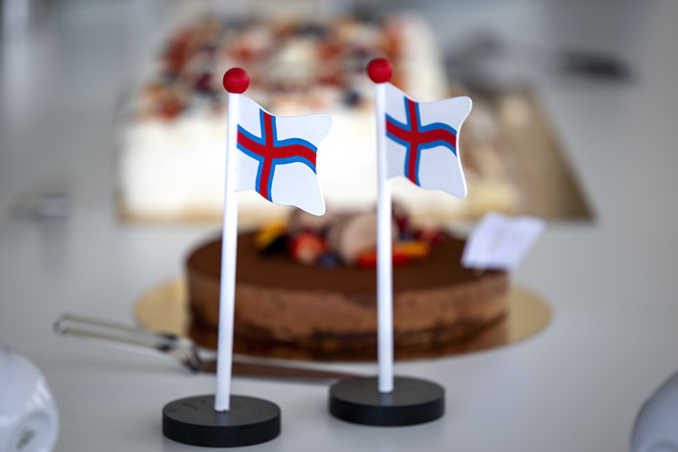 a cake with a flag on top